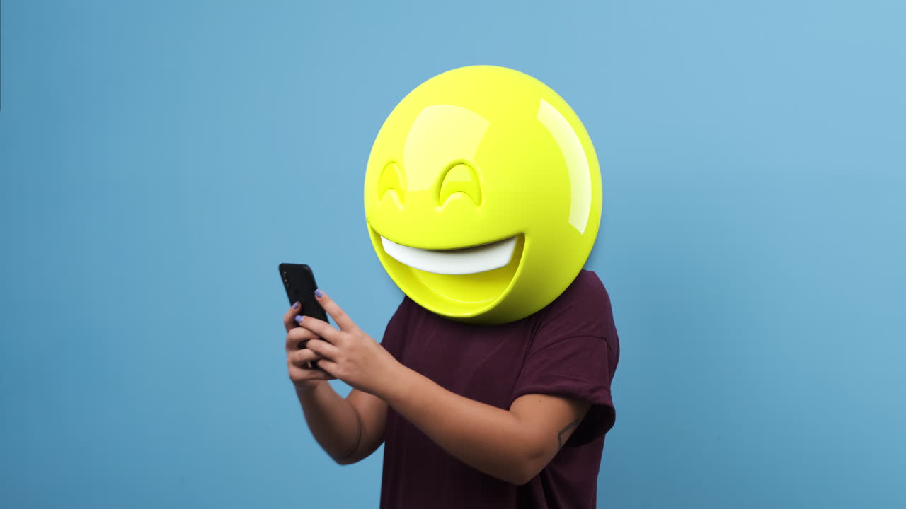 Emoji smile head woman using a smartphone. Emoji concept