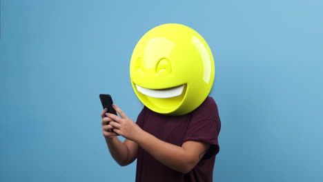 emoji smile head woman using a smartphone. emoji concept