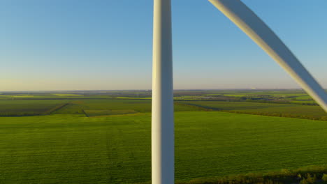 Windmill-blades-rotating-in-closeup.-Wind-tower-creating-energy-in-slow-motion.