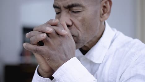 praying-to-god-with-hands-together-on-grey-background-stock-video-stock-footage