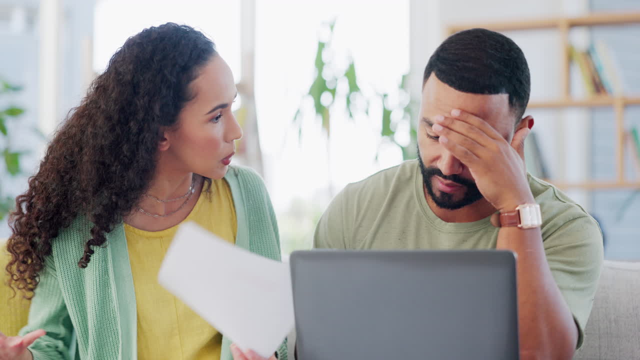 Angry couple stress for bills