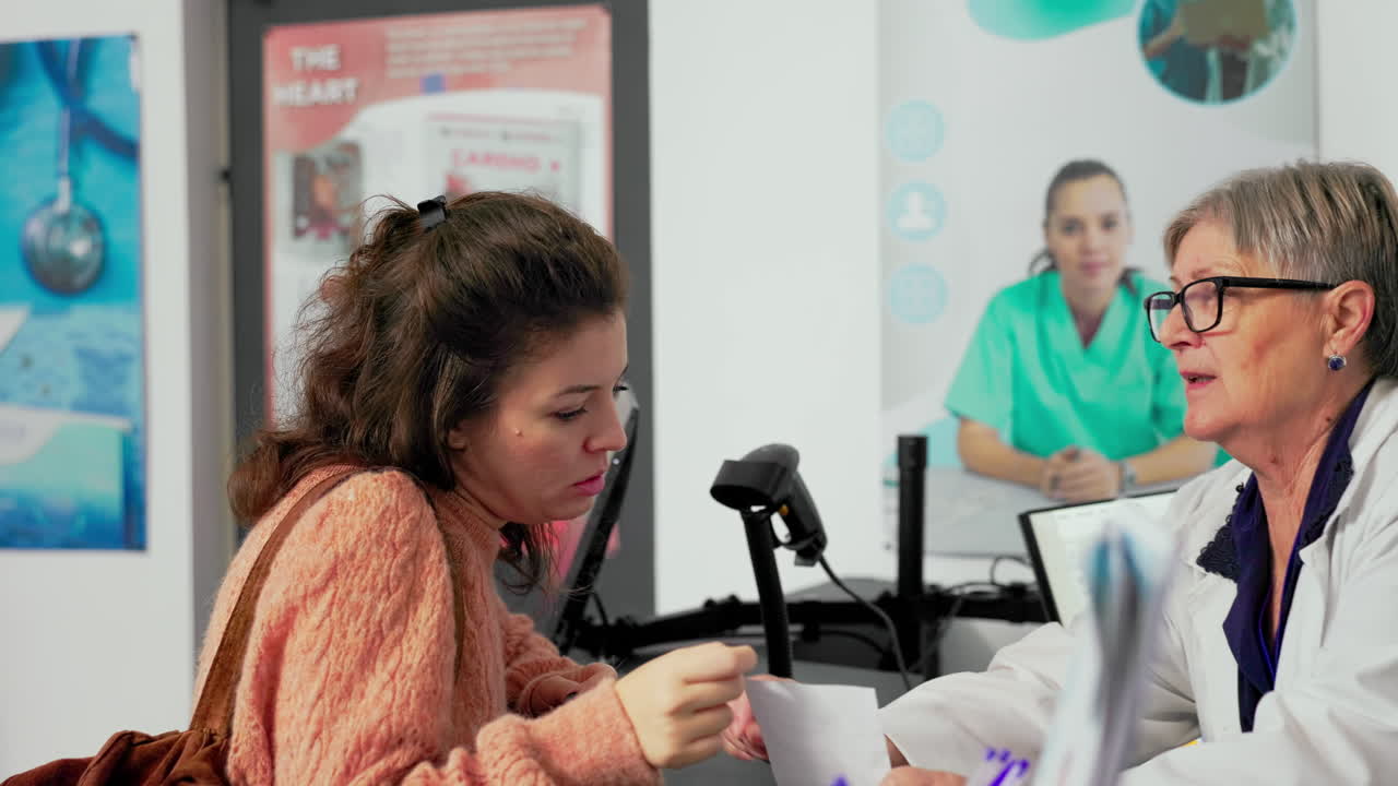 Customer interacting with pharmacist at the counter