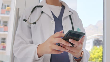 hands, smartphone and doctor typing message