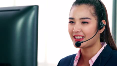 business people wearing headset working in office