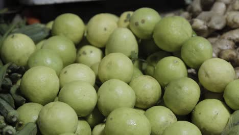 raw green organic fresh lemon vegetables at retail store for sale at evening