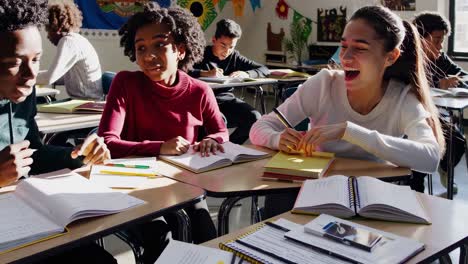 teenagers studying in a classroom