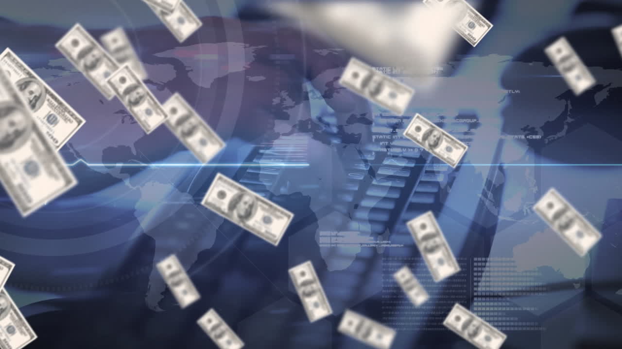анимация банкнот американского доллара, падающих на клавиатуру компьютера