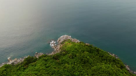 experience the beauty of phuket island’s stone coast, green forests, and blue waters with a 4k drone flight