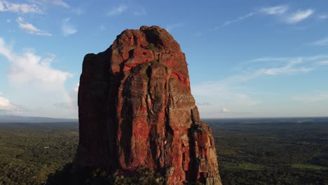 Aerial-orbits-dramatic-rock-spire,-Tower-of-David-in-golden-evening