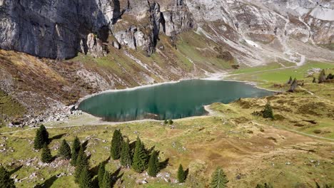stunning aerial view of an alpine lake in the swiss alps