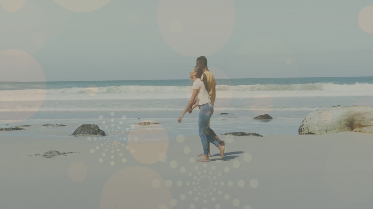 아프리카계 미국인 부부 가  ⁇ 고 손을 잡고 있는 빛의 반점 의 애니메이션