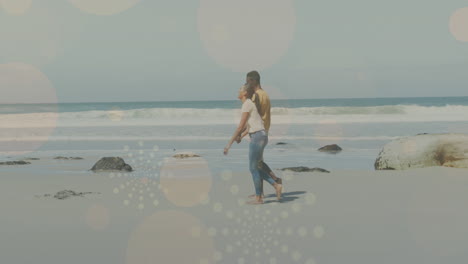 animación de puntos de luz sobre una pareja afroamericana caminando y tomados de la mano