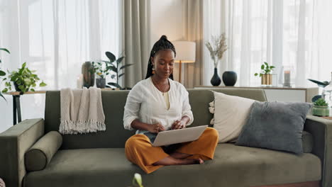 Black-woman-on-sofa,-smile