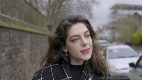 portrait of a joyful woman walking toward camera