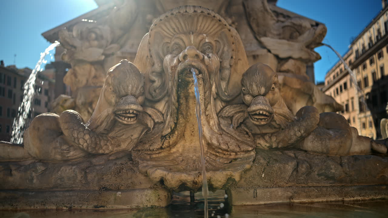 Close up view of the Fountain of the Pantheon in sunlight. Slow motion
