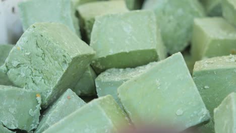 close-up of cubes of green soap