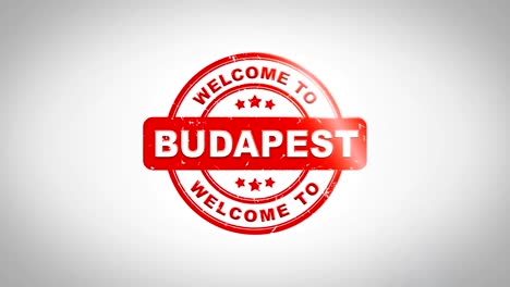 welcome to budapest  signed stamping text wooden stamp animation. red ink on clean white paper surface background with green matte background included.