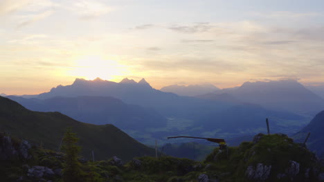 aerial view across sunrise silhouetted kitzbüheler horn mountain in panoramic tyrol alps mountain range