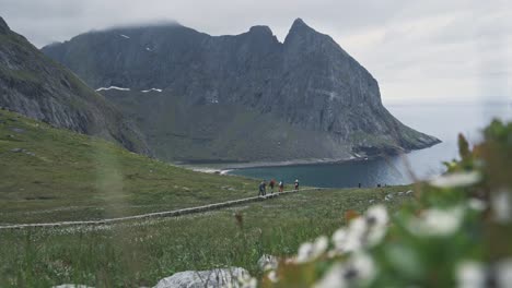 ryten hike pathway in lofoten area with group of people walk in norway