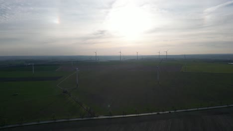aerial wind mill turbine park farm germany producing renewable energy