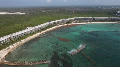 Tulum's-Hilton-resort-aerial-perspective-on-guest-accommodations,-Yucatan-Caribbean-Mexico's