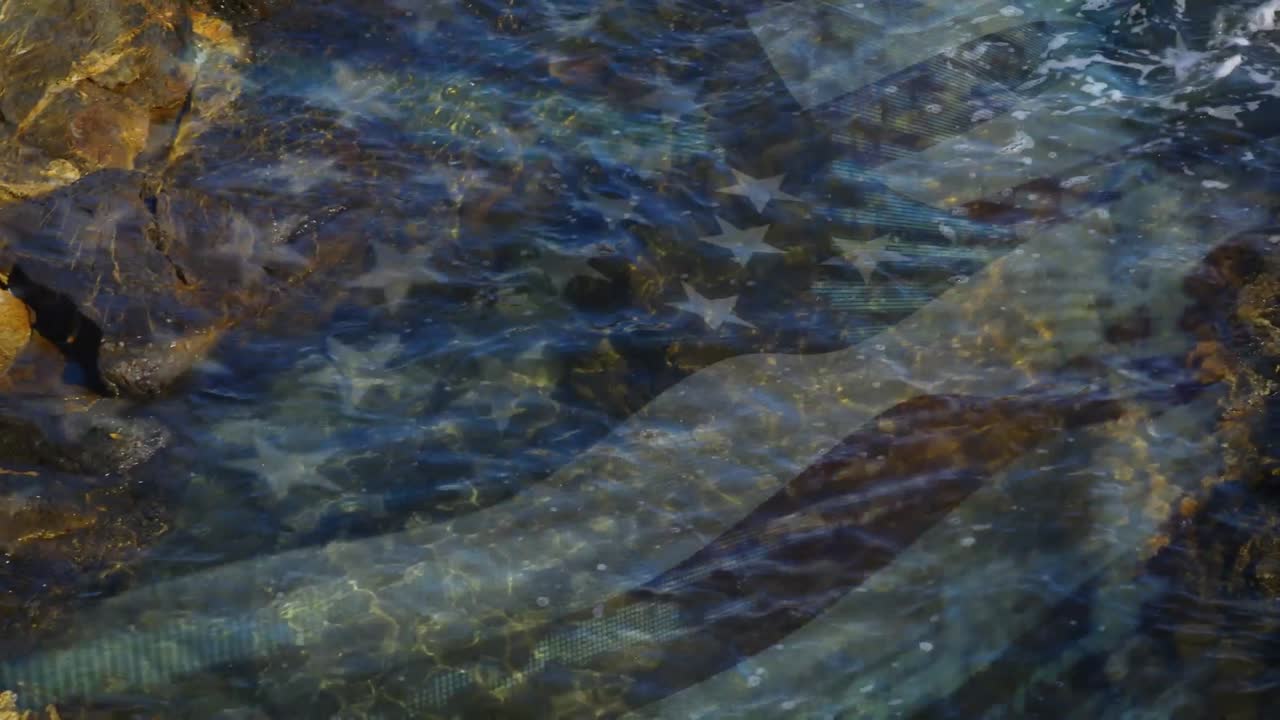 animación de la bandera de los estados unidos de américa soplando sobre el mar en un rockpool