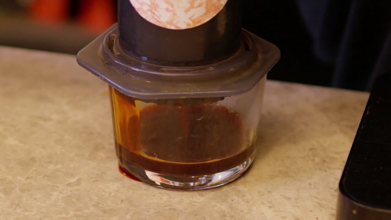 Immerse yourself in the art of brewing coffee in a warm modern setting with an urban vibe.