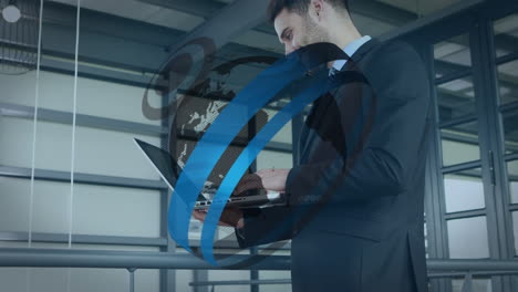 animation of round scanner over spinning globe against caucasian businessman using laptop at office