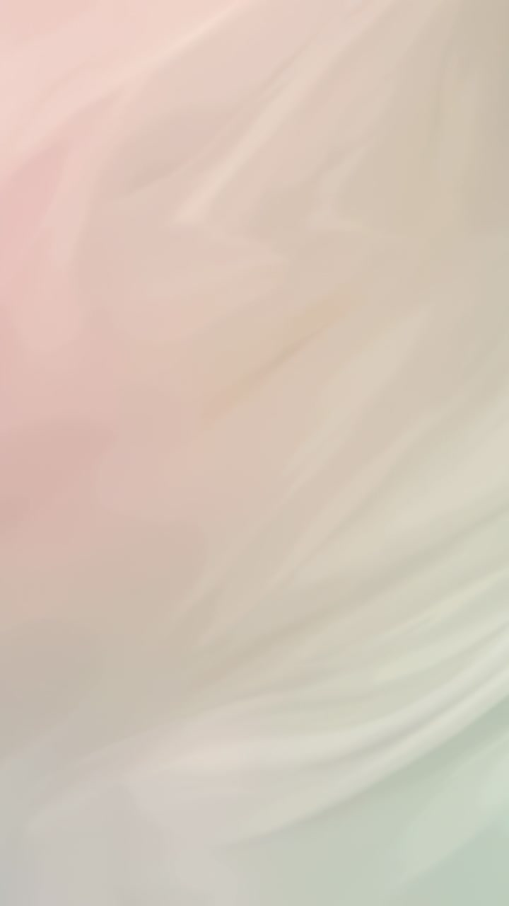 Vertical video: Shifting soft pastel swirl reacting to slight cam shift in closeup, showing folds