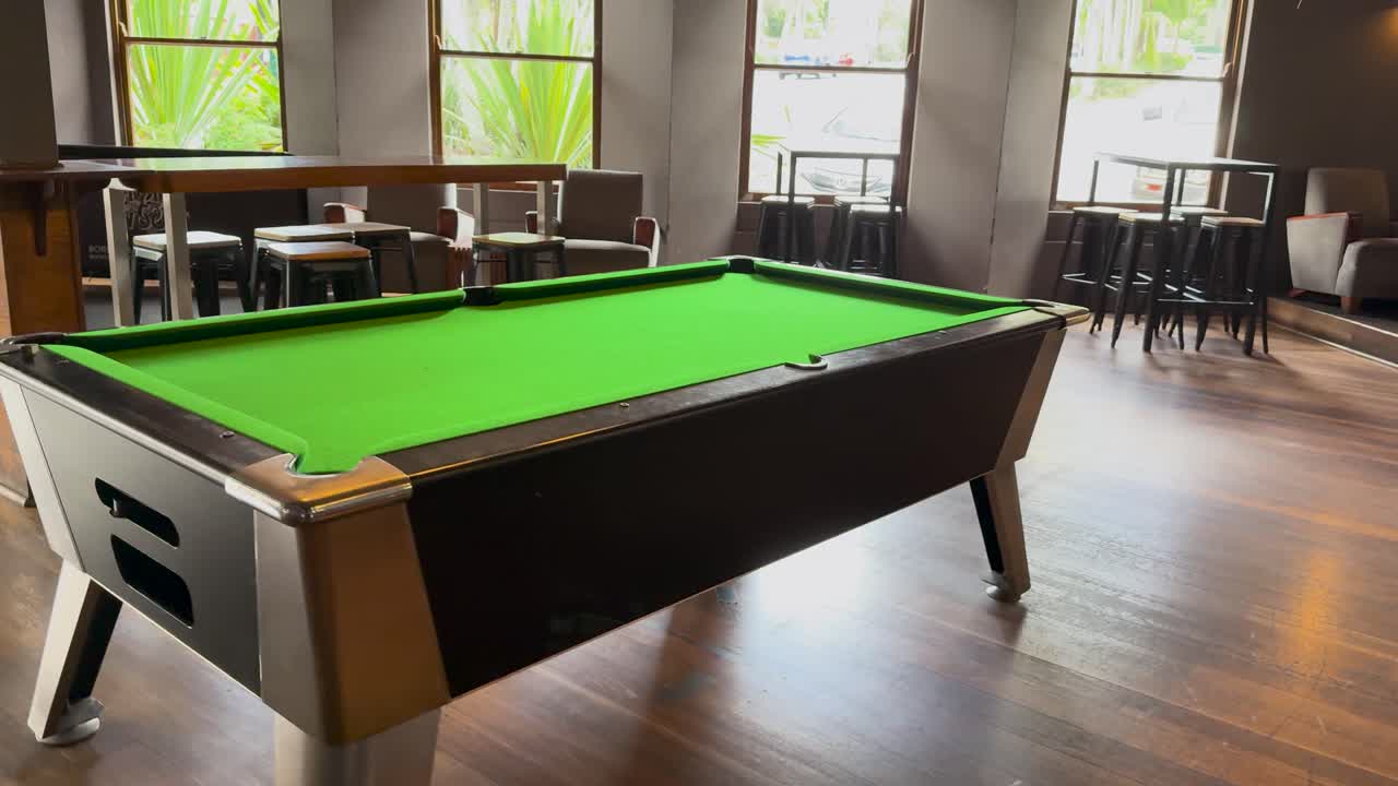 A quiet snooker room with no activity