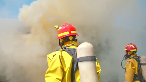 firefighters at a building fire