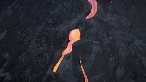 aerial view of lava streams from the volcano cumbre vieja erupting