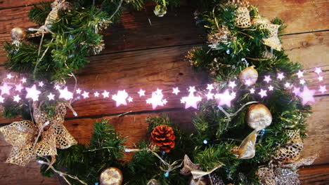 animation of star string lights and decorated christmas wreath