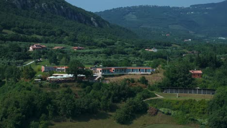 aerial view of golf ca 'degli ulivi located in marciaga surrounded by lush green foliage