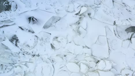 Flying-Above-Frozen-Ice-on-Lake