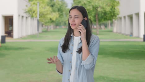 indian girl talking with someone on call