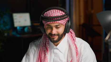 employee works with headphones on