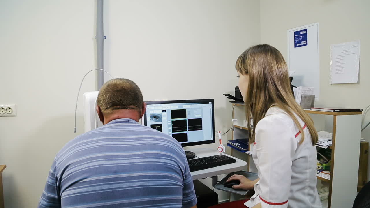 Optometrist examining male patient. Patient man examining eyes by optometrist using phoropter