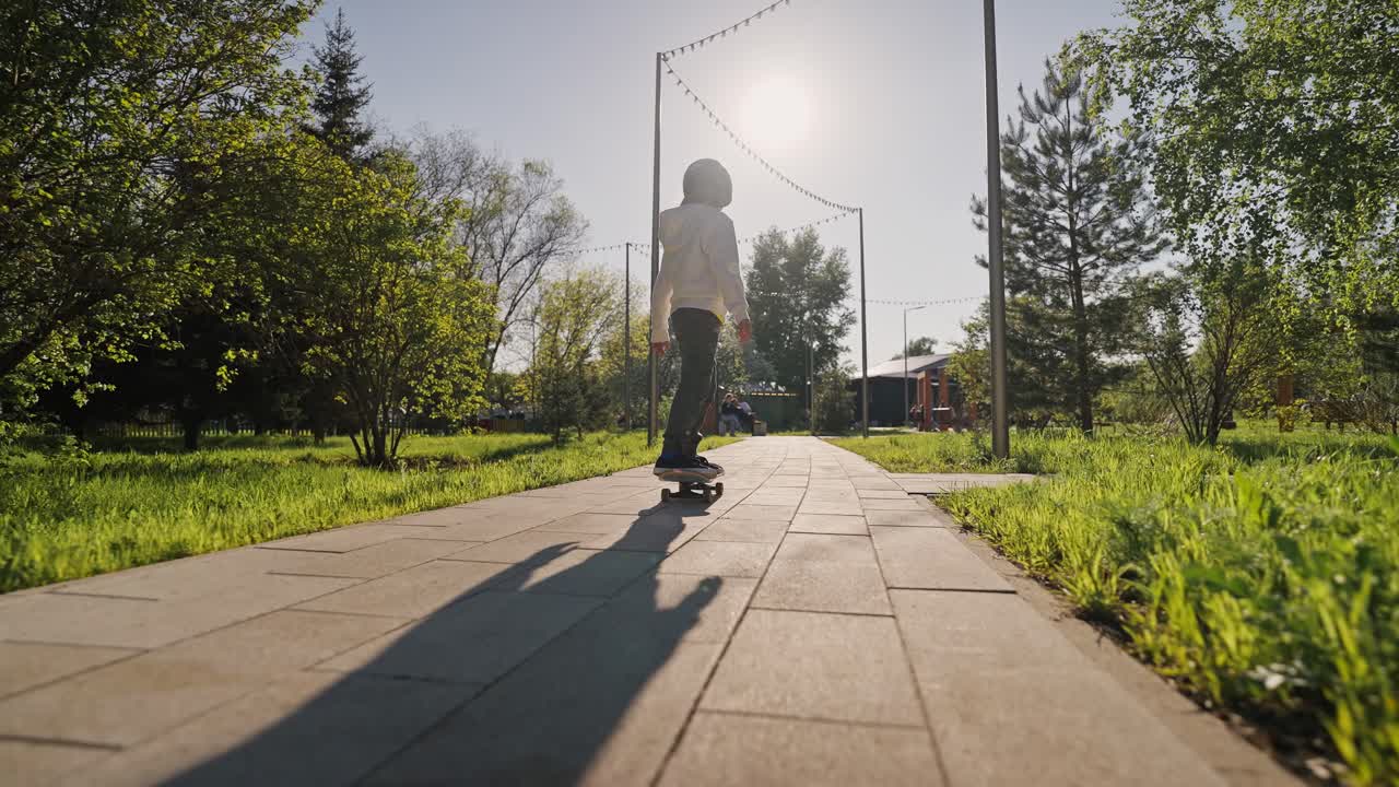 Boy Skateboarding in Park