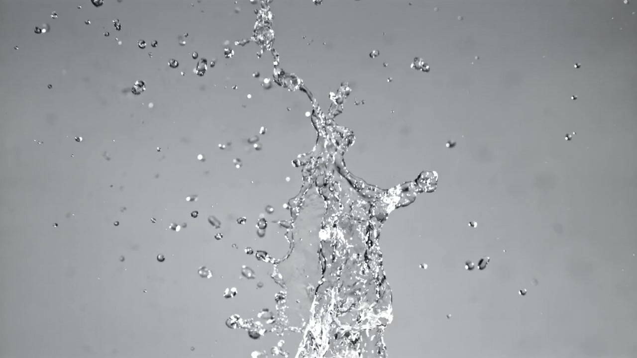 Slow Motion Water Splash and Rising Droplets on Grey Background