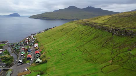 establishing shot of kvivik village in a valley, viking settlement