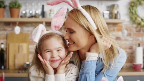 video portrait of mother and daughter in the ears of rabbit