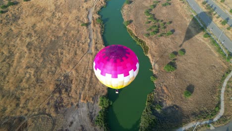 hot air balloons flying over chilean lagoons