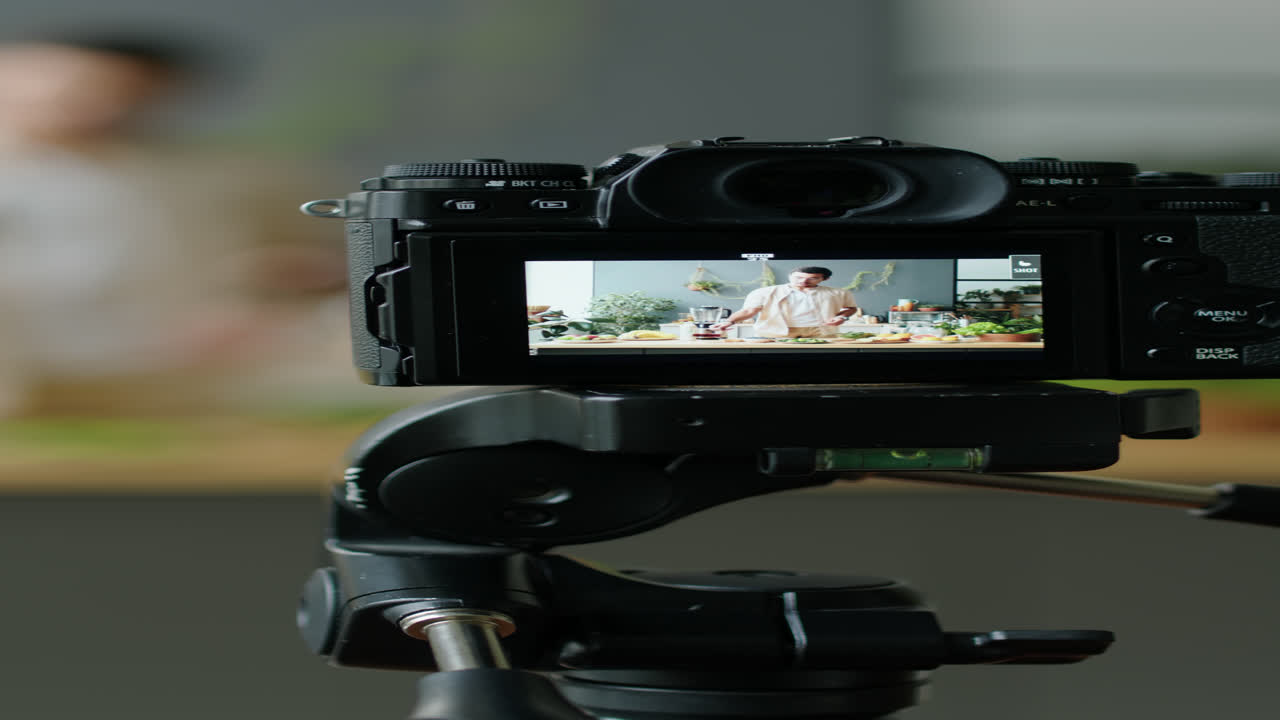 Digital Camera Recording Male Food Blogger