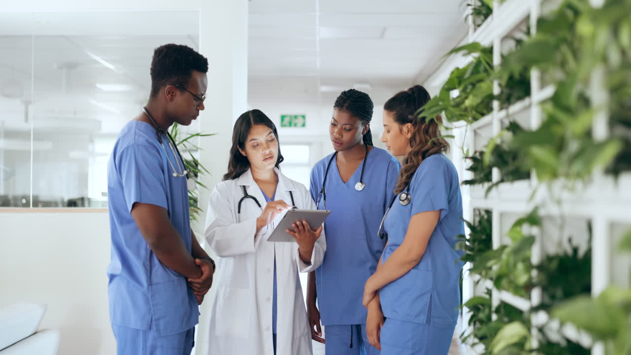 Staff, doctors and nurses with tablet