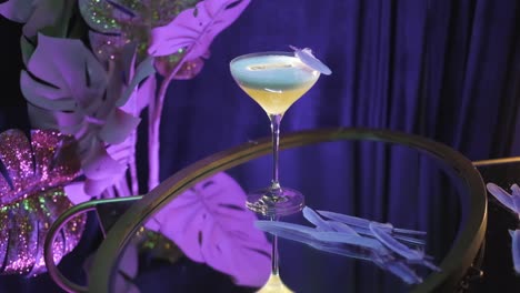 elegant cocktail on a mirrored tray