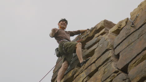 climber on a wall rock