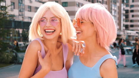 two women laughing and having fun