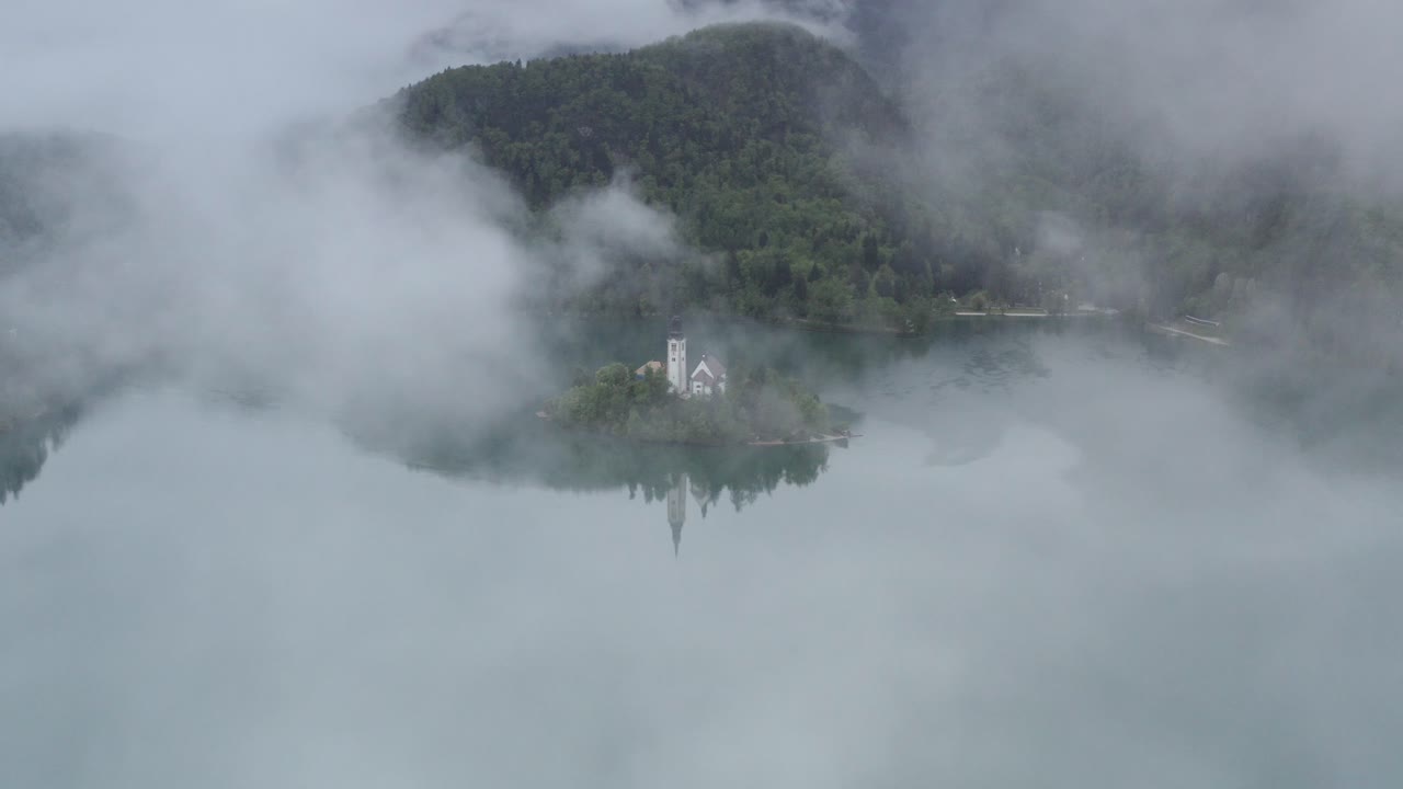 Misty Lake Bled Island with Church Reflection