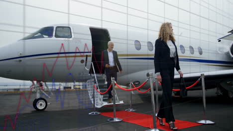 exiting private jet, business professionals with stock market graph animation overlay